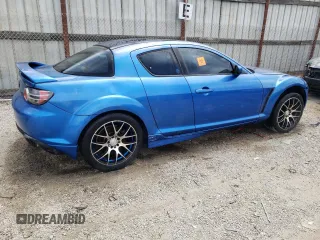 2005 Mazda RX-8 with VIN JM1FE173450144529, listed as a Copart auction lot 56769284 with 0 mi miles and Salvage Title. Bid and sale history available at carsss.com. Image 3.