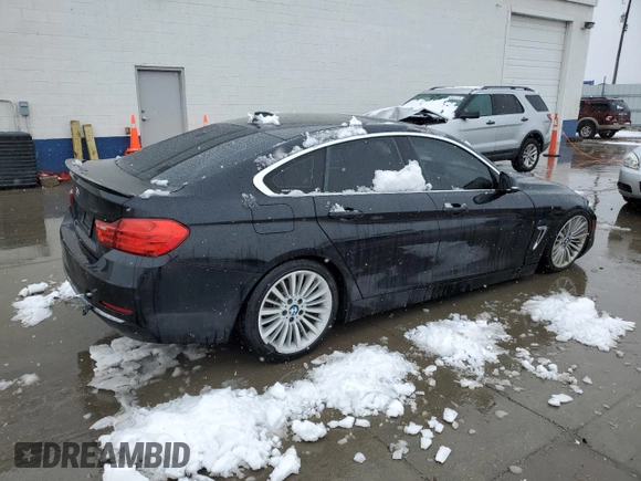 2015 BMW 4 Series 428i xDrive with VIN WBA4C9C54FD330601, listed as a Copart auction lot 45168955 with 112,408 mi miles and Salvage title. Bid and sale history available at DreamBid. Image 3.