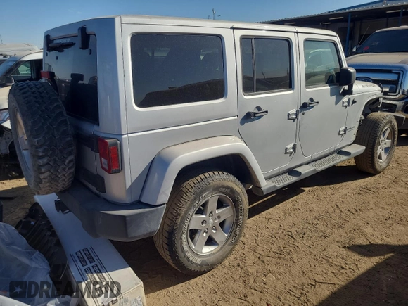 2012 Jeep Wrangler Unlimited Call of Duty MW3 с VIN 1C4BJWFG3CL103865, выставлен на аукционе Copart как лот 74237754 с пробегом 104 232 миль миль и Списание • Salvage title. История ставок и продаж доступна на DreamBid. Изображение 3.