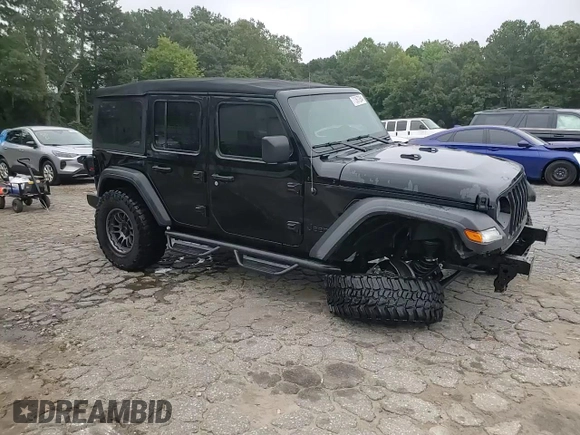 2023 Jeep Wrangler Sport with VIN 1C4HJXDN9PW638737, listed as a Copart auction lot 71367284 with 12,054 mi miles and Salvage Title. Bid and sale history available at DreamBid. Image 13.