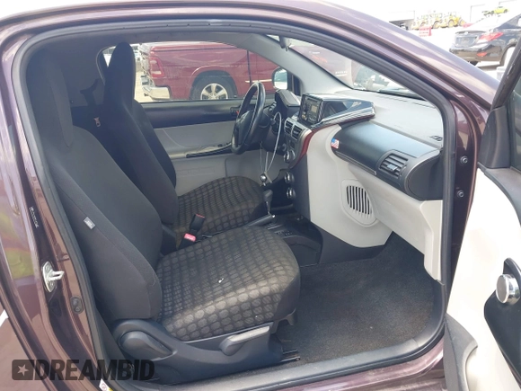 2012 Scion iQ with VIN JTNJJXB0XCJ021245, listed as a IAAI auction lot 42463167 with 158,901 mi miles and . Bid and sale history available at DreamBid. Image 5.