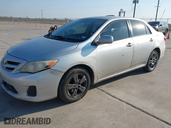 2011 Toyota Corolla L with VIN JTDBU4EE0BJ102517, listed as a IAAI auction lot 41702532 with 296,646 mi miles. Bid and sale history available at carsss.com. Image 2.
