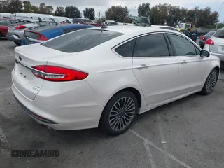 2017 Ford Fusion SE with VIN 3FA6P0HD0HR180188, listed as a IAAI auction lot 42146020 with 100,901 mi miles and . Bid and sale history available at DreamBid. Image 4.