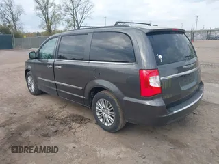 2015 Chrysler Town & Country Touring L with VIN 2C4RC1CG9FR646214, listed as a IAAI auction lot 42202486 with 184,555 mi miles and . Bid and sale history available at carsss.com. Image 3.