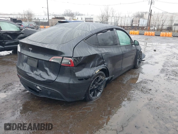 2025 Tesla Model Y Long Range with VIN 7SAYGDED6SF226035, listed as a IAAI auction lot 41102115 with Not Provided miles and . Bid and sale history available at DreamBid. Image 4.