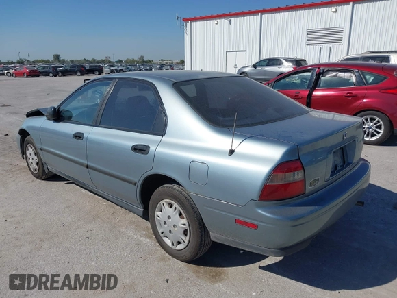 1995 Honda Accord DX with VIN 1HGCD562XSA045128, listed as a IAAI auction lot 40563511 with 143,206 mi miles. Bid and sale history available at carsss.com. Image 3.