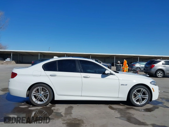 2014 BMW 5 Series 528i with VIN WBA5A5C50ED503130, listed as a IAAI auction lot 41819922 with 135,923 mi miles. Bid and sale history available at carsss.com. Image 13.