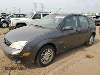 2005 Ford Focus S z VIN 3FAFP37NX5R134987, wystawiony jako Copart lot #60478825 z przebiegiem 204 927 mil mil oraz Czysty tytuł • Clean title. Historia ofert i sprzedaży dostępna na DreamBid. Obrazek 1.