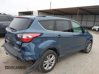 2018 Ford Escape SE with VIN 1FMCU0GD0JUC58115, listed as a IAAI auction lot 41578309 with 76,162 mi miles. Bid and sale history available at carsss.com. Image 4.
