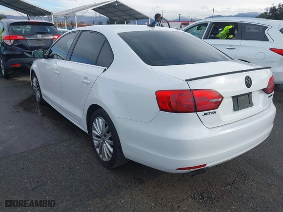 2013 Volkswagen Jetta Sedan SEL w/Nav with VIN 3VWLP7AJ4DM355195, listed as a IAAI auction lot 41422256 with 122,877 mi miles. Bid and sale history available at carsss.com. Image 3.