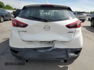 2018 Mazda CX-3 Sport z VIN JM1DKDB73J0331461, wystawiony jako Copart lot #58520265 z przebiegiem 69 458 mil mil oraz Szkoda całkowita • Salvage title. Historia ofert i sprzedaży dostępna na DreamBid. Obrazek 6.