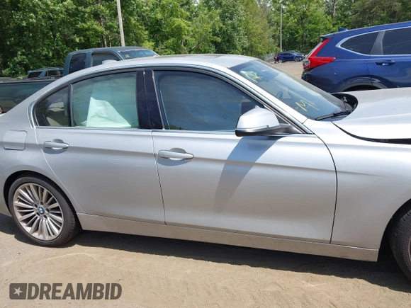 2013 BMW 3 Series 335i with VIN WBA3A9C55DF475648, listed as a IAAI auction lot 42310502 with 151,823 mi miles and . Bid and sale history available at DreamBid. Image 13.