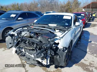 2021 Ford Mustang GT with VIN 1FA6P8CF8M5156290, listed as a IAAI auction lot 41277660 with 28,818 mi miles. Bid and sale history available at carsss.com. Image 2.