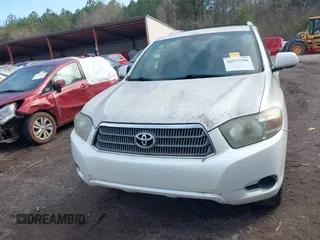 2009 Toyota Highlander Hybrid with VIN JTEEW41A192031712, listed as a IAAI auction lot 41577398 with 126,805 mi miles. Bid and sale history available at carsss.com. Image 12.