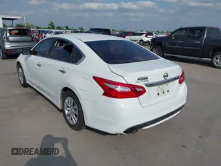 2016 Nissan Altima S with VIN 1N4AL3AP5GN310804, listed as a IAAI auction lot 42044974 with 140,021 mi miles and . Bid and sale history available at carsss.com. Image 3.