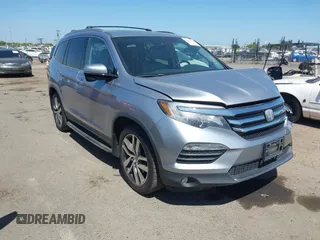 2017 Honda Pilot Touring with VIN 5FNYF6H99HB000969, listed as a IAAI auction lot 42551558 with 125,095 mi miles and . Bid and sale history available at DreamBid. Image 1.