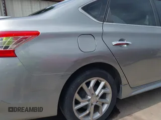 2013 Nissan Sentra SR z VIN 3N1AB7AP8DL696413, wystawiony jako IAAI lot #42116029 z przebiegiem 113 409 mil mil oraz . Historia ofert i sprzedaży dostępna na DreamBid. Obrazek 6.