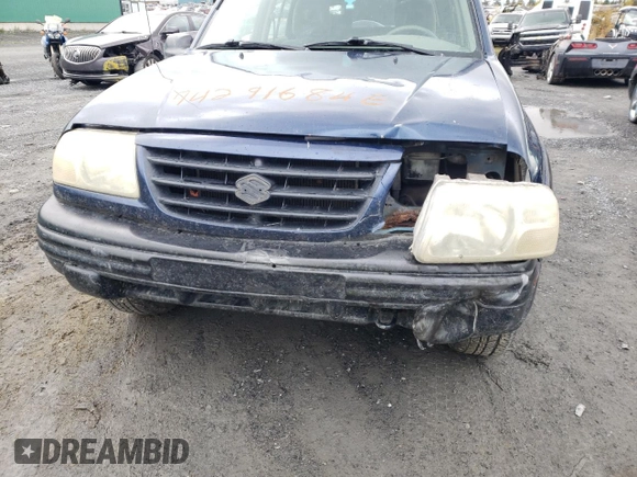 2004 Suzuki Vitara z VIN 2S3TD62VX46100019, wystawiony jako Copart lot #74291684 z przebiegiem 148 566 mil mil oraz Szkoda całkowita • Salvage title. Historia ofert i sprzedaży dostępna na DreamBid. Obrazek 13.