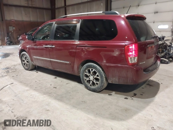 2014 Kia Sedona EX with VIN KNDMH4C74E6547870, listed as a IAAI auction lot 41403040 with 156,005 mi miles. Bid and sale history available at carsss.com. Image 3.