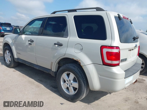 2008 Ford Escape XLT with VIN 1FMCU03178KA76736, listed as a IAAI auction lot 42672474 with 218,472 mi miles and . Bid and sale history available at DreamBid. Image 3.