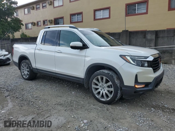 2023 Honda Ridgeline RTL-E with VIN 5FPYK3F76PB064582, listed as a Copart auction lot 63629375 with 11,940 mi miles and Salvage title. Bid and sale history available at DreamBid. Image 4.