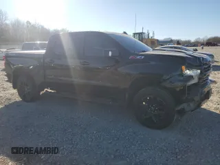 2023 Chevrolet Silverado 1500 LT Trail Boss with VIN 3GCUDFE84PG273892, listed as a Copart auction lot 46909745 with 59,466 mi miles and Salvage Title. Bid and sale history available at DreamBid. Image 4.