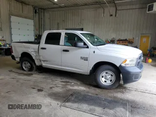 2019 Ram 1500 Tradesman with VIN 3C6RR7KG9KG628094, listed as a Copart auction lot 55074074 with 82,029 mi miles and Salvage title. Bid and sale history available at DreamBid. Image 4.