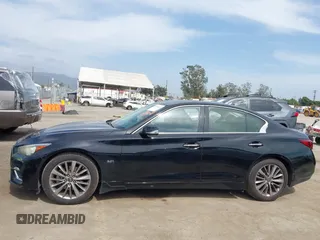 2019 Infiniti Q50 Luxe with VIN JN1EV7AP9KM543079, listed as a IAAI auction lot 42244113 with 36,291 mi miles and . Bid and sale history available at DreamBid. Image 14.