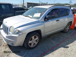 2007 Jeep Compass Sport with VIN 1J8FT47067D418752, listed as a IAAI auction lot 41785177 with 183,100 mi miles. Bid and sale history available at carsss.com. Image 2.