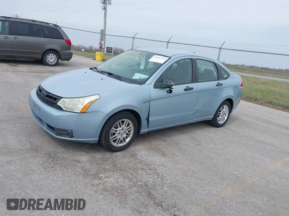 2009 Ford Focus SE with VIN 1FAHP35N59W157060, listed as a IAAI auction lot 41871757 with 141,558 mi miles. Bid and sale history available at carsss.com. Image 2.