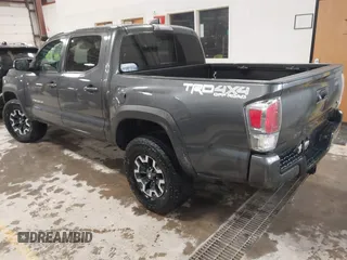 2021 Toyota Tacoma SR z VIN 3TMCZ5AN2MM444249, wystawiony jako IAAI lot #41942146 z przebiegiem 59 429 mil mil oraz . Historia ofert i sprzedaży dostępna na DreamBid. Obrazek 3.
