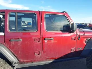 2021 Jeep Wrangler Unlimited Willys with VIN 1C4HJXDM7MW729606, listed as a IAAI auction lot 41294338 with Not Provided miles and . Bid and sale history available at DreamBid. Image 14.