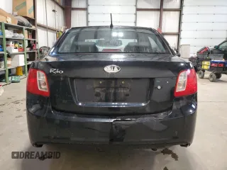 2010 Kia Rio with VIN KNADH4B37A6641845, listed as a Copart auction lot 51861215 with 163,894 mi miles and Salvage Title. Bid and sale history available at DreamBid. Image 6.