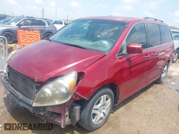2006 Honda Odyssey EX-L with VIN 5FNRL38606B426919, listed as a IAAI auction lot 42077458 with 125,161 mi miles and . Bid and sale history available at carsss.com. Image 2.