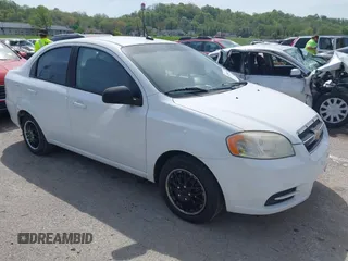 2011 Chevrolet Aveo 1LT with VIN KL1TD5DE7BB139819, listed as a IAAI auction lot 42090773 with 124,559 mi miles and . Bid and sale history available at DreamBid. Image 1.