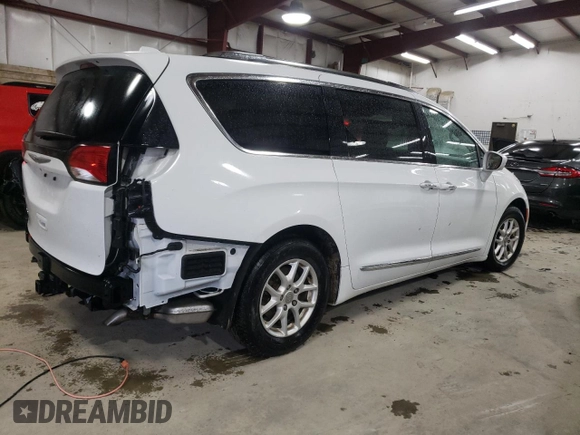 2020 Chrysler Pacifica Touring L with VIN 2C4RC1BGXLR128514, listed as a Copart auction lot 57333635 with 71,109 mi miles and Salvage title. Bid and sale history available at DreamBid. Image 3.