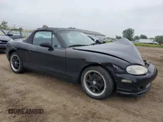 1999 Mazda MX-5 Miata with VIN JM1NB3531X0102616, listed as a Copart auction lot 59779415 with 194,494 mi miles and Salvage title. Bid and sale history available at DreamBid. Image 4.