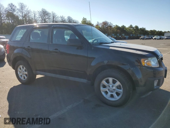2011 Mazda Tribute Touring with VIN 4F2CY0C73BKM02889, listed as a Copart auction lot 68182214 with 139,491 mi miles and Clean Title. Bid and sale history available at carsss.com. Image 4.