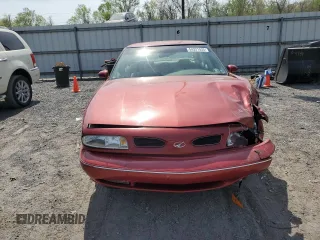 1998 Oldsmobile 88 LS z VIN 1G3HN52K2W4809677, wystawiony jako Copart lot #54331535 z przebiegiem 99 587 mil mil oraz Szkody całkowita. Historia ofert i sprzedaży dostępna na DreamBid. Obrazek 5.
