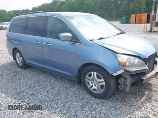 2007 Honda Odyssey EX z VIN 5FNRL38467B018506, wystawiony jako IAAI lot #42107465 z przebiegiem 276 919 mil mil oraz . Historia ofert i sprzedaży dostępna na DreamBid. Obrazek 1.