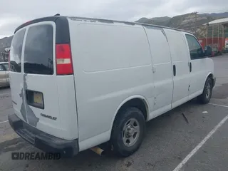 2004 Chevrolet Express Cargo Van with VIN 1GCFG15X241101221, listed as a IAAI auction lot 42012481 with 139,786 mi miles. Bid and sale history available at carsss.com. Image 4.