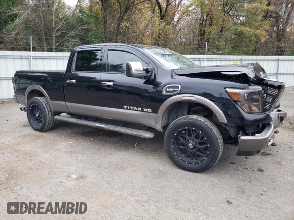2017 Nissan Titan XD SL with VIN 1N6AA1F41HN548361, listed as a Copart auction lot 84654174 with 142,057 mi miles and Salvage Title. Bid and sale history available at carsss.com. Image 4.