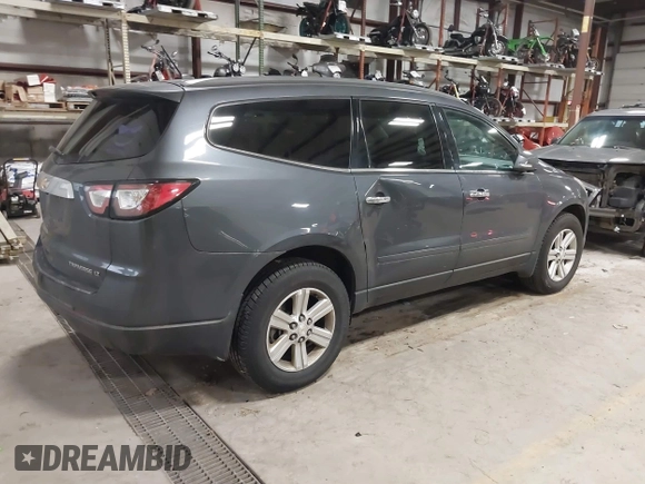 2013 Chevrolet Traverse LT with VIN 1GNKVJKD9DJ152592, listed as a IAAI auction lot 41143281 with 199,259 mi miles and . Bid and sale history available at DreamBid. Image 4.