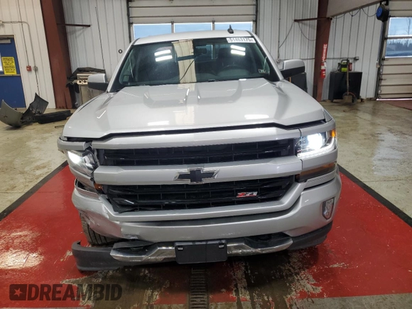 2018 Chevrolet Silverado 1500 LT with VIN 3GCUKREC8JG588990, listed as a Copart auction lot 51463175 with 101,602 mi miles and Salvage Title. Bid and sale history available at carsss.com. Image 5.