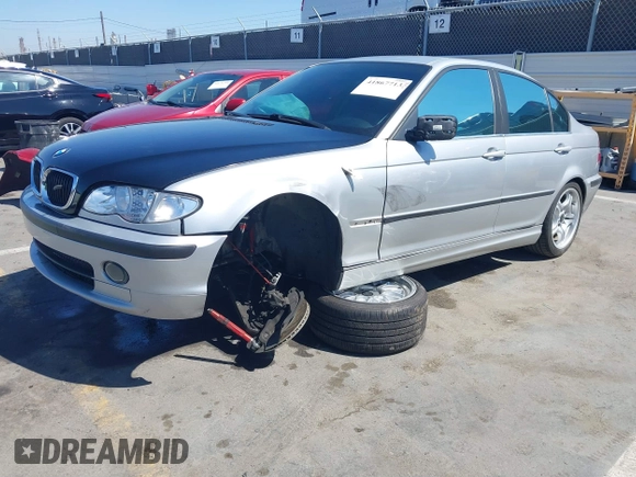 2002 BMW 3 Series 330i with VIN WBAEV53482KM22427, listed as a IAAI auction lot 41867713 with 205,653 mi miles and . Bid and sale history available at DreamBid. Image 2.