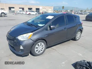 2014 Toyota Prius One with VIN JTDKDTB33E1061088, listed as a IAAI auction lot 42040762 with 206,735 mi miles and . Bid and sale history available at DreamBid. Image 2.