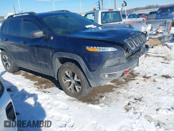 2014 Jeep Cherokee Trailhawk with VIN 1C4PJMBS8EW182259, listed as a IAAI auction lot 41309329 with Not Provided miles. Bid and sale history available at carsss.com. Image 1.