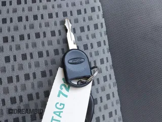 2007 Ford Focus S z VIN 1FAHP34N07W360761, wystawiony jako IAAI lot #40754946 z przebiegiem 121 371 mil mil oraz . Historia ofert i sprzedaży dostępna na DreamBid. Obrazek 11.