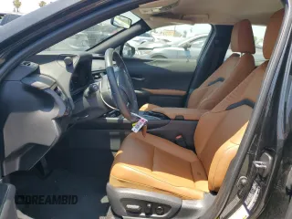 2020 Lexus UX 250h with VIN JTHX9JBH2L2034610, listed as a Copart auction lot 62195585 with 24,992 mi miles and Salvage title. Bid and sale history available at DreamBid. Image 7.