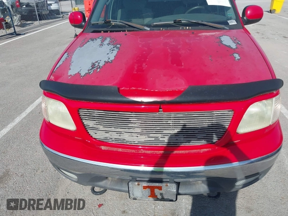2003 Ford F-150 XLT with VIN 1FTRW08L43KD14456, listed as a IAAI auction lot 42098830 with 234,908 mi miles. Bid and sale history available at carsss.com. Image 6.